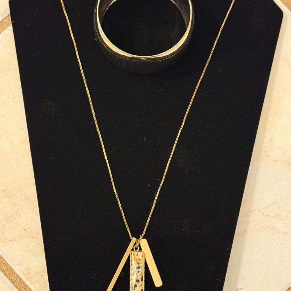 Anthropologie Gold necklace and gold bangle set